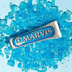 Authentic Marvis imported toothpaste tube with distinct silver cap on vanity background