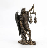 Lifestyle display angle of the antique bronze finished archangel sculpture.