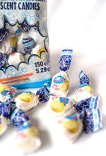 Hand holding Brioschi lemon effervescent candy