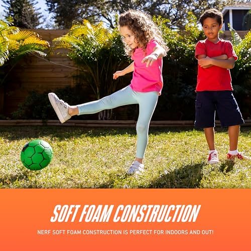 Nerf children soft training soccer ball on backyard grass showing outdoor usability.