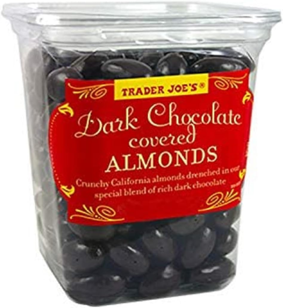 Crunchy California almonds coated in rich dark chocolate snack close up