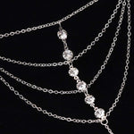 Suyi silver tone slave bracelet on wrist