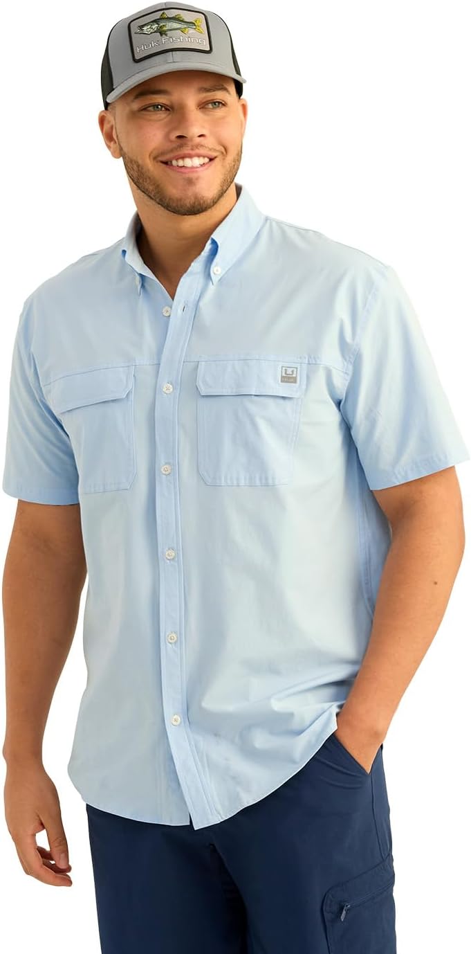 HUK branded logo accent on shirt