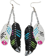 Black white and clear liquid clay blended with alcohol inks and glitter
