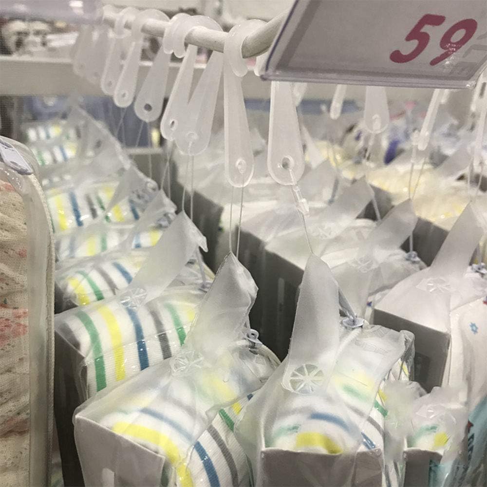Bulk pack of white plastic hooks displayed with a tag gun compatibility layout.