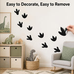 Dinosaur track stickers styled creatively on nursery furniture and cabinets