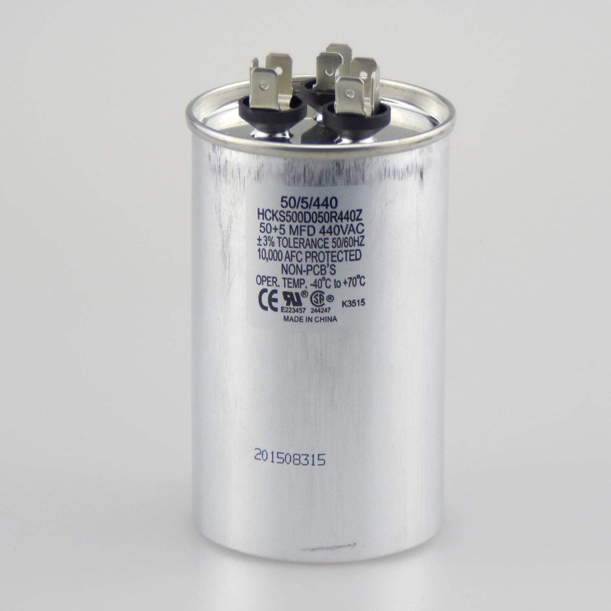The HVAC Genius round capacitor top terminal view showing dual connections