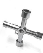 F.L.S universal utility key resting on a flat surface for scale