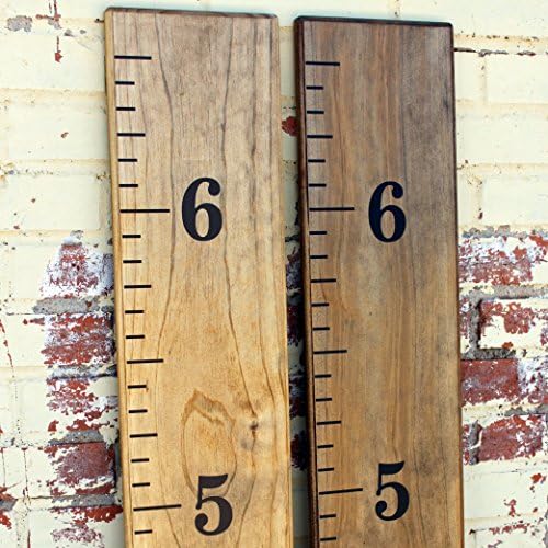 Little Acorns decal kit applied to a rustic wooden board.
