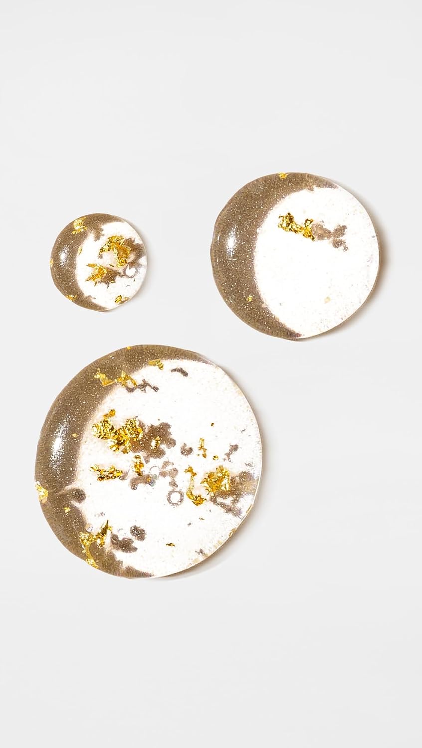 Kopari Golden Aura Body Oil close up of liquid texture showing real gold shimmer