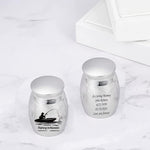 Gredstar pet and human ash urn held in palm