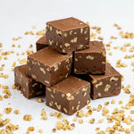 Rich chocolate caramel pecan fresh artisan candy texture view.