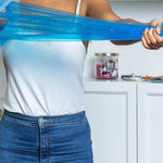 Securely knotted bottom of the blue non see through cat waste disposal bag inside a pail system.