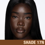Charlotte Tilbury Beautiful Skin Foundation set in lifestyle setting