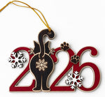 Fun holiday decoration for kitten owners hanging on display
