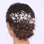 Jumwrit wedding hair comb front view showcasing silver rhinestones and pearls