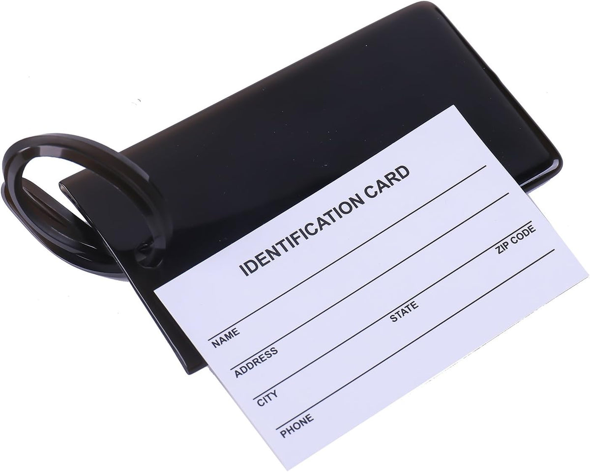 AI-DEE suitcase tags attached to luggage handle