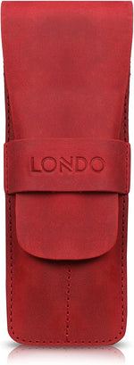 Brown leather stationery bag resting on a desk