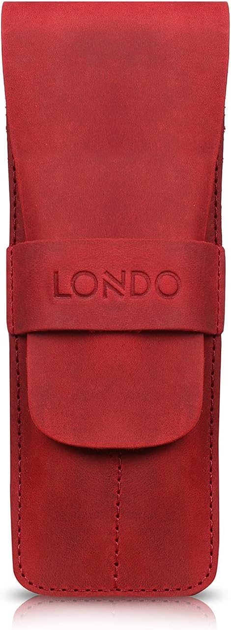 Brown leather stationery bag resting on a desk