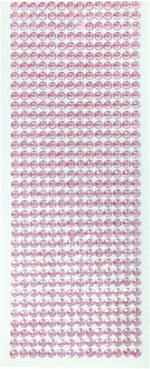 Close-up of faceted pink acrylic diamond gems