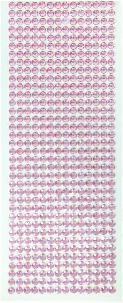 Close-up of faceted pink acrylic diamond gems