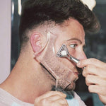 MIKEBE beard shaping tool front view showing clear plastic construction and integrated comb