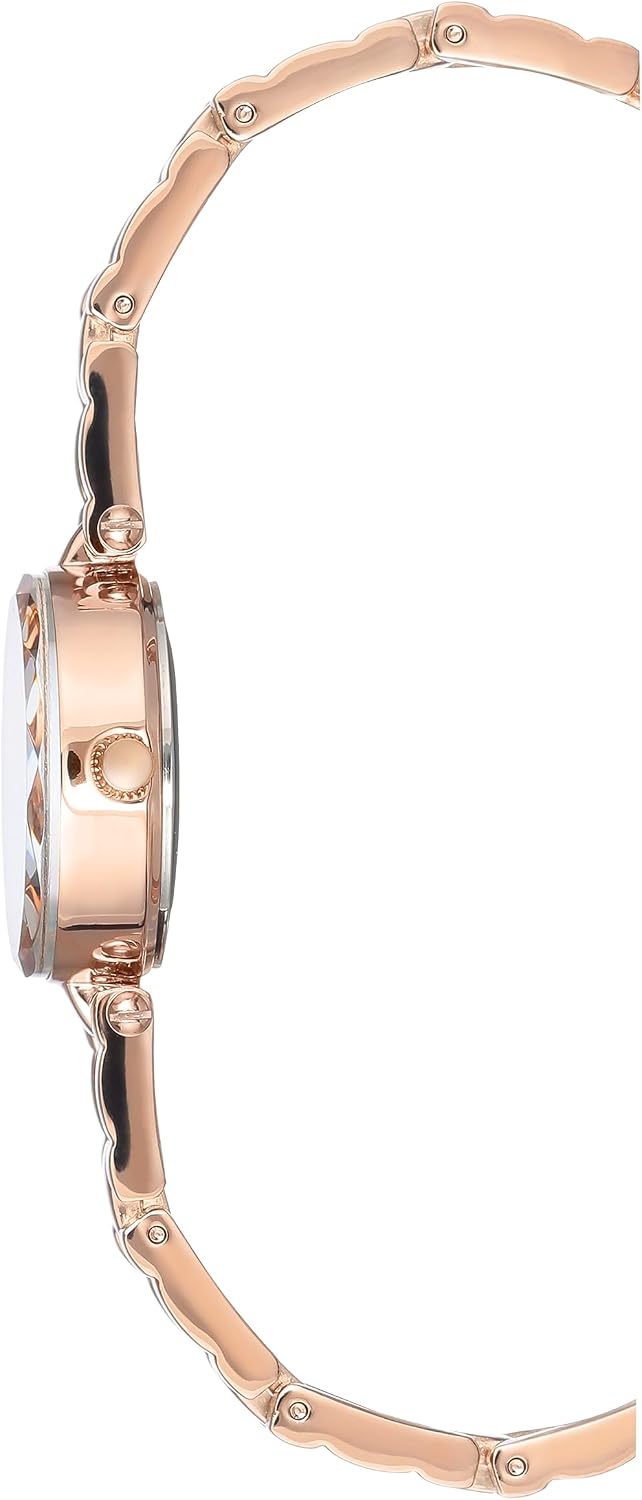 Anne Klein crystal accented watch dial and mother of pearl details