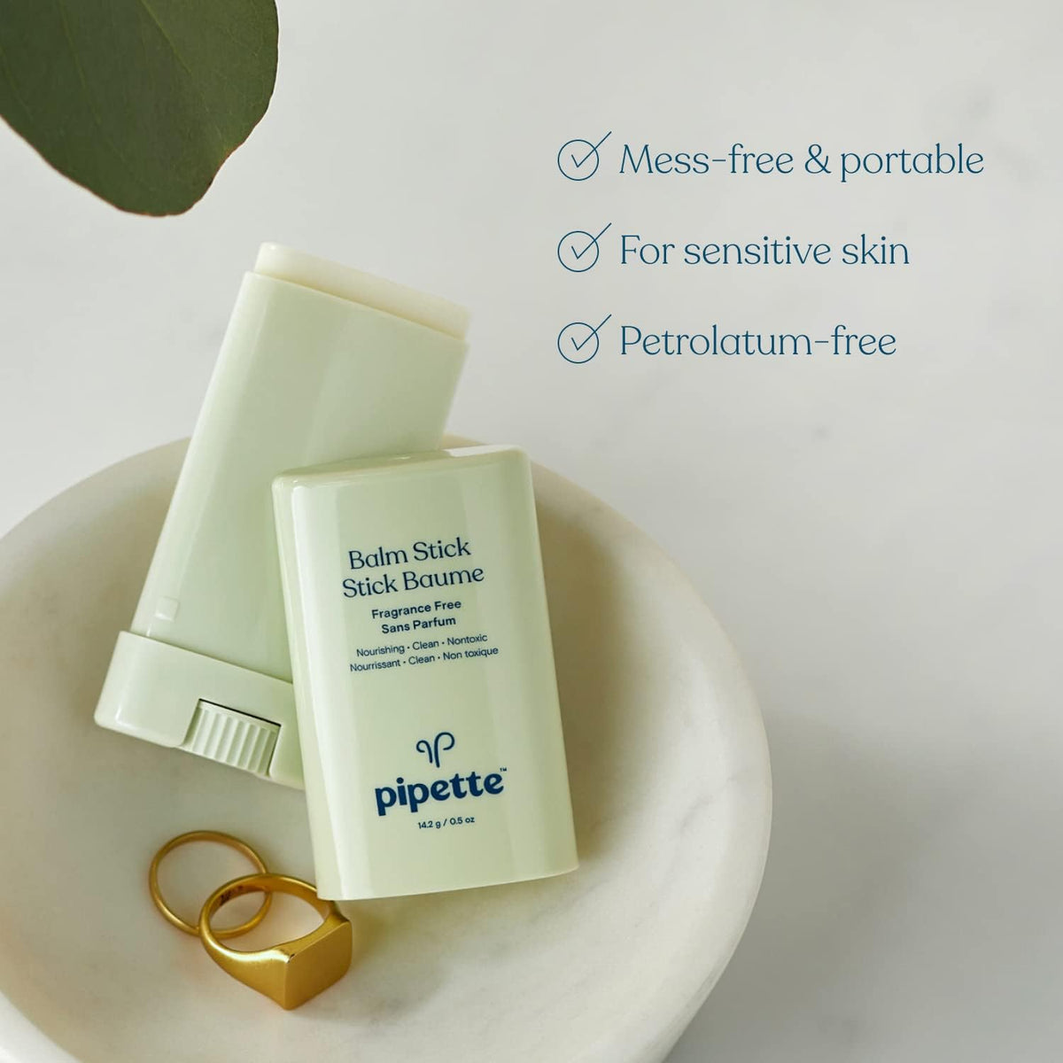 Pipette moisturizer stick showing twist-up mechanism