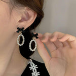 Zeshimb black bow stud earrings backing and post detail