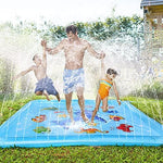 Side angle view of multiple kids water jets spraying from the perimeter of the blue splash pad mat