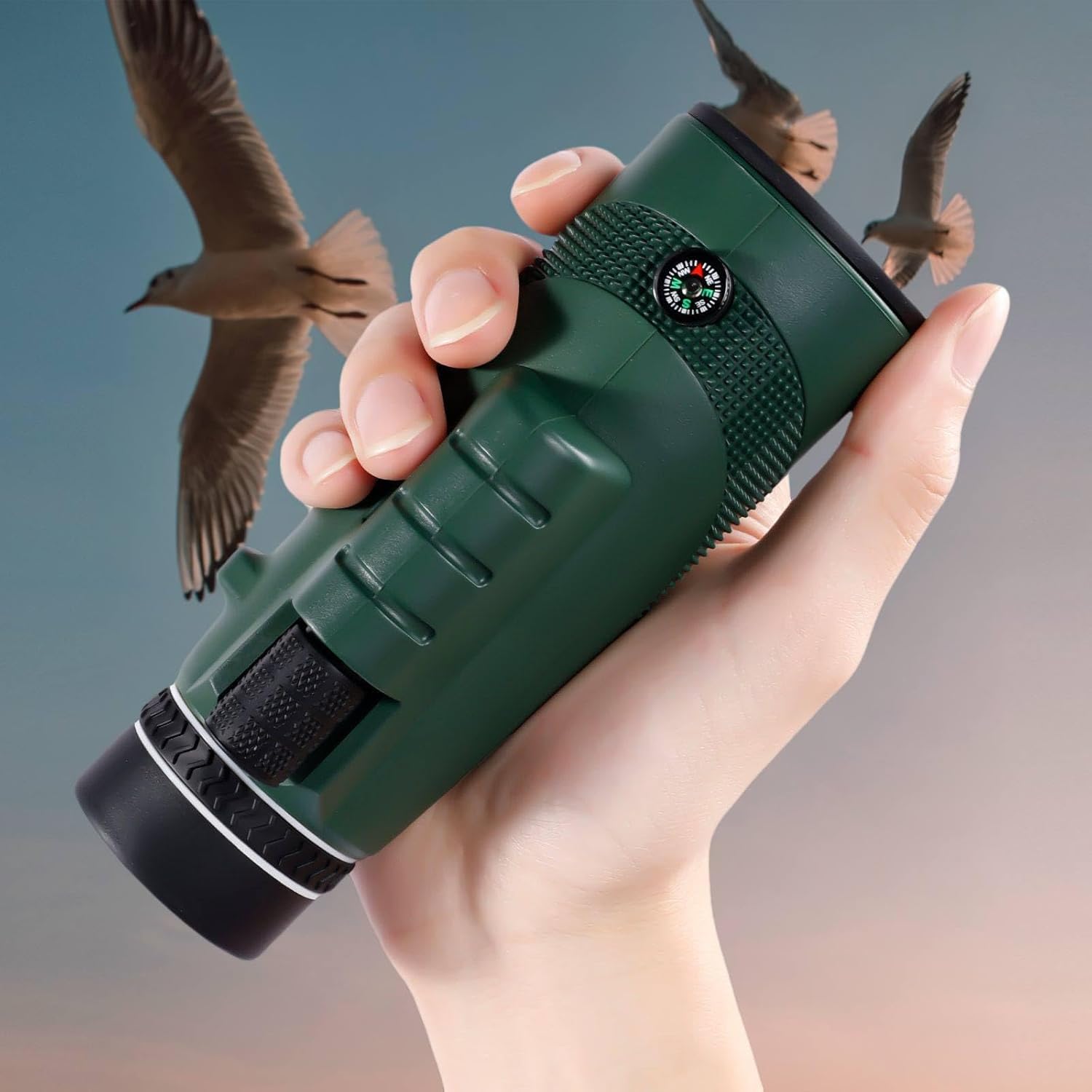 Generic 10x40 compact monocular telescope front view showing the green objective lens housing.