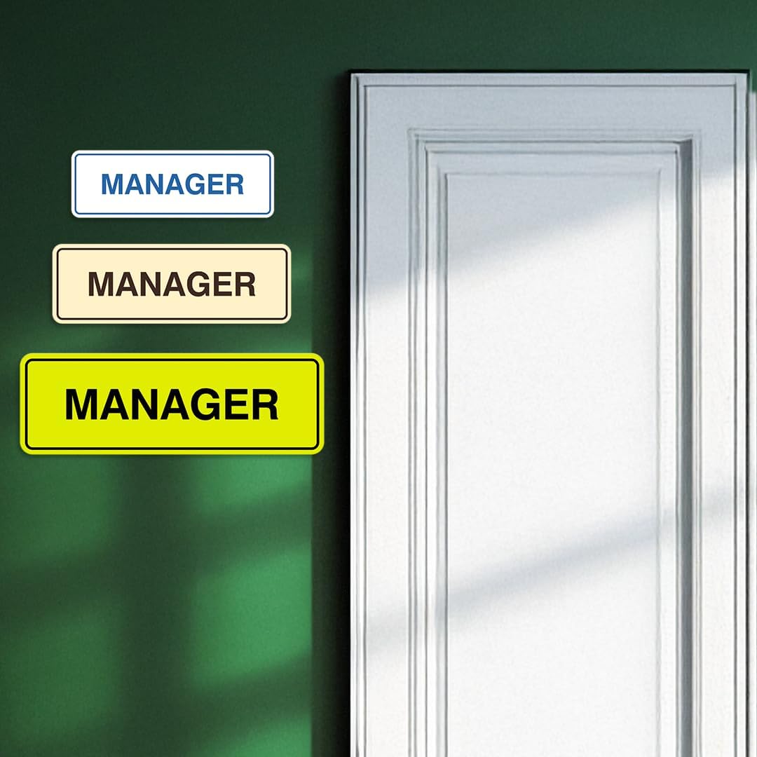 All Quality manager sign mounted on a glass office door partition