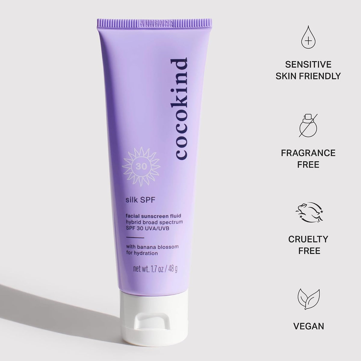 Lavender purple packaging design of Cocokind daily facial fluid sunscreen