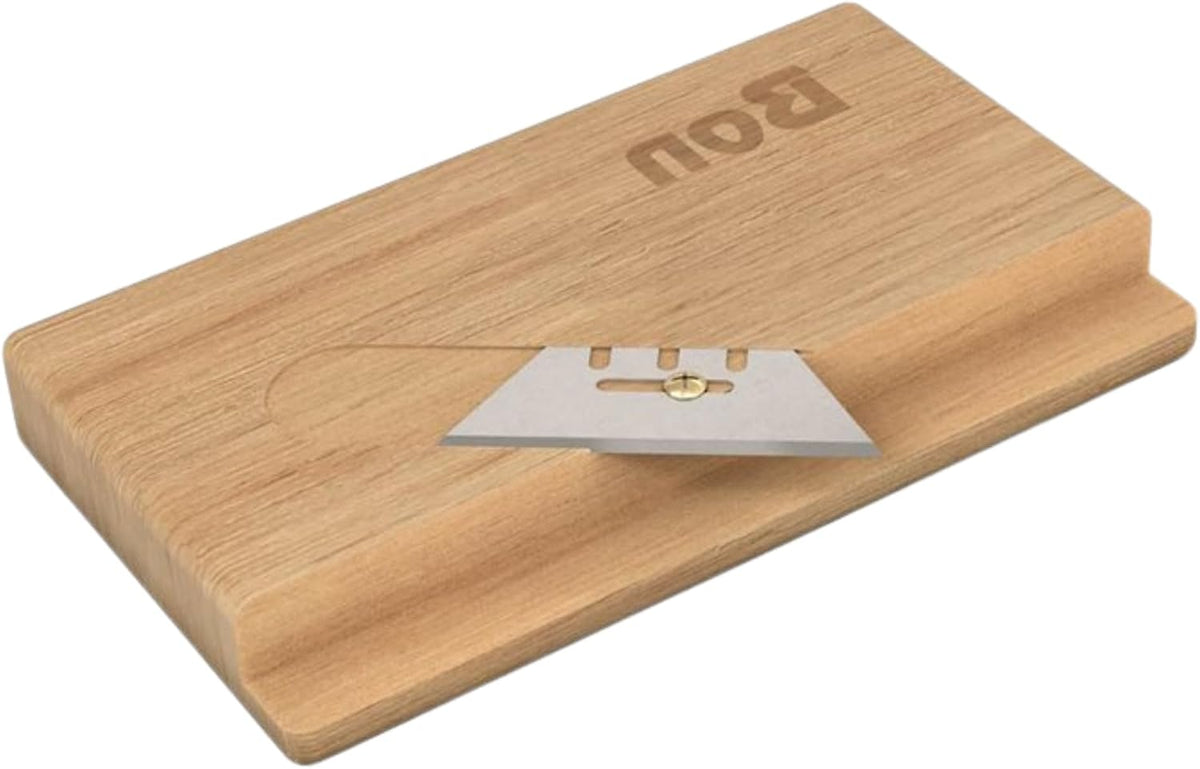 Bon ceiling tile cutter showing adjustable blade and hardwood block