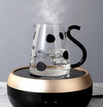 RockTrend cow shaped carafe and drinking cup overhead layout