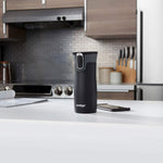 Contigo West Loop travel mug showing Autoseal push button mechanism