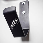 Black powder coated finish close-up of the fitness storage bracket