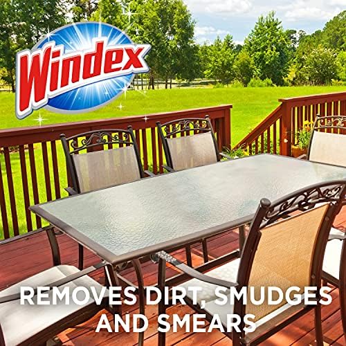 Windex Ammonia Free glass cleaner being used on exterior house windows.