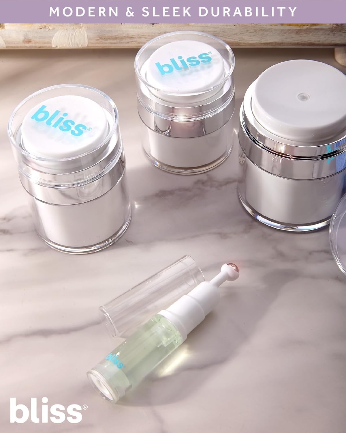 Bliss airless pump bottles travel containers displaying the innovative vacuum dispenser mechanism.