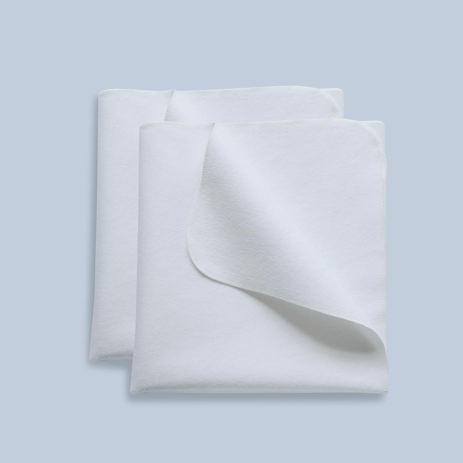 Shunjie Home waterproof crib pad 2 pack front view showcasing the white quilted flannel texture.