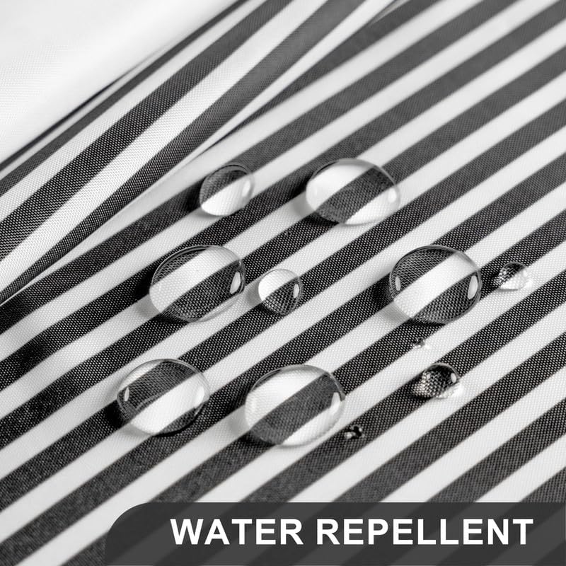 Top border detail of the AmazerBath striped curtain highlighting the reinforced rustproof metal grommets.