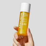 APRILSKIN Calendula hydrating and resurfacing face serum bottle highlighting the leave on formula.