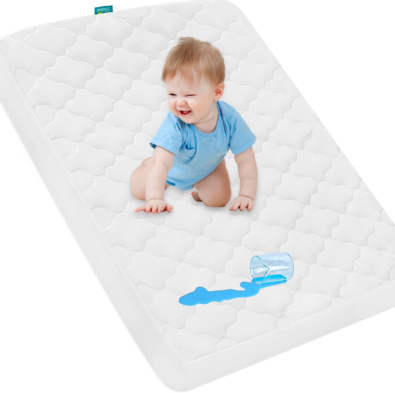 Biloban pack and play mattress protector cover front view on crib mattress