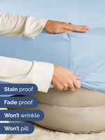 Elasticized edge detail hugging a thick mattress securely