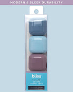 Pastel colored Bliss travel storage jars for creams and liquids.