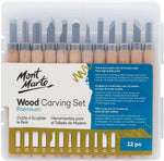 Artisan hands working with Mont Marte wood carving tools
