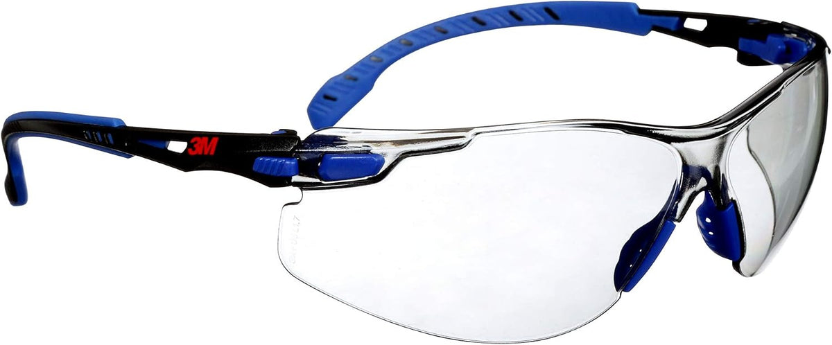 3M safety glasses resting on a flat surface with full frame visible