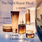 Estee Lauder luxury nighttime foaming cleanser bottle on a solid surface.