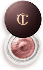 Professional makeup application of Charlotte Tilbury cream eyeshadow