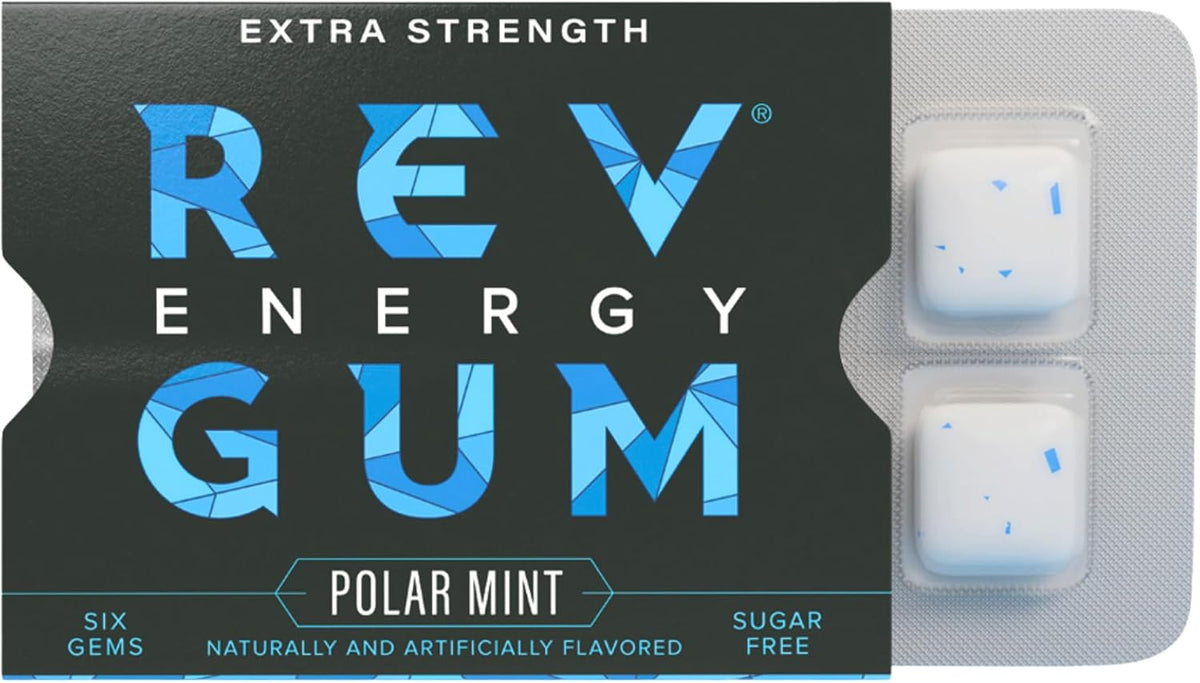 Portable blister pack of REV caffeine energy gum being held for lifestyle demonstration